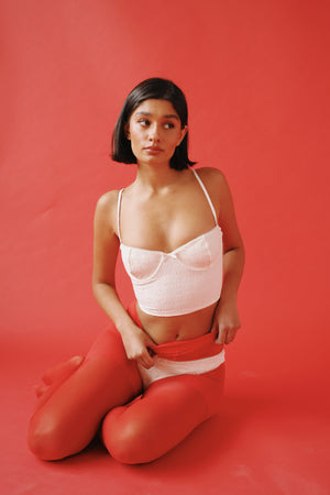 Amrita is 5'9" wearing Size S.