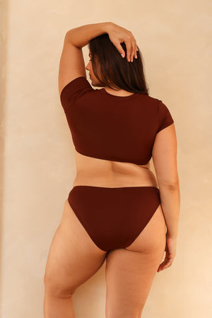 Juliana is 5'10" wearing XL.