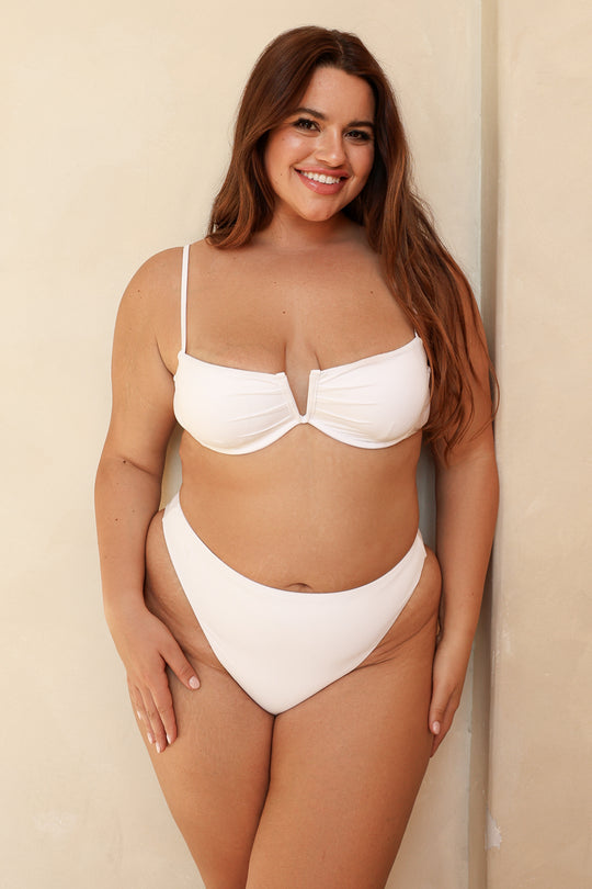 Kacie is 5'8" wearing XL.