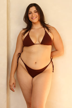Juliana is 5'10" wearing XL.