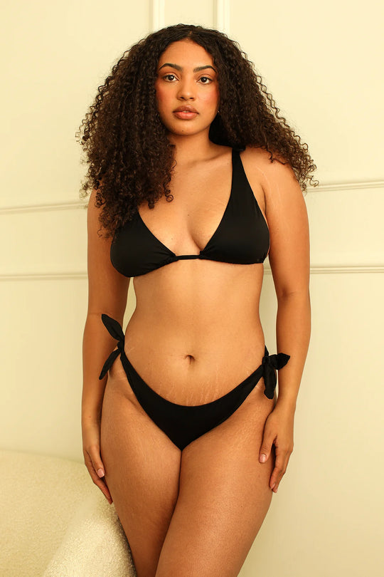 Arriana is 5'9" wearing Size XL.