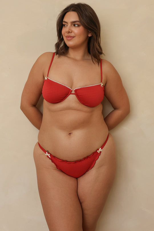 Kacie is 5'8" wearing XL.