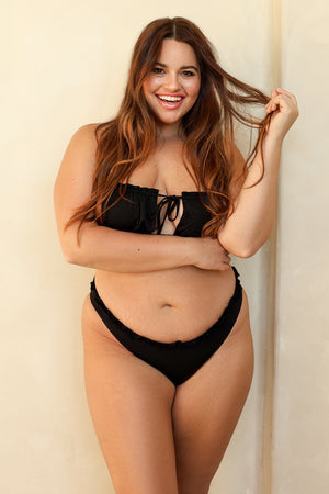 Kacie is 5'8" wearing XL.