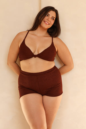 Julianna is 5'10" wearing XL.
