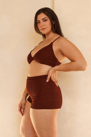 Julianna is 5'10" wearing XL.