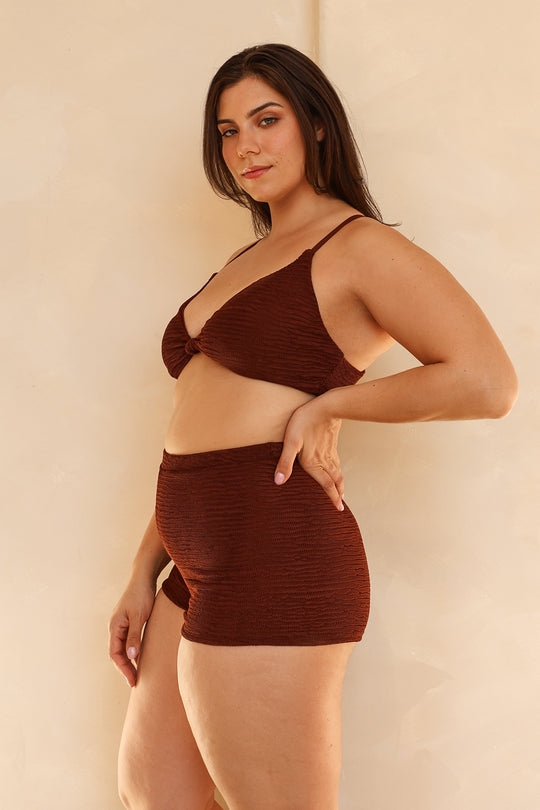 Julianna is 5'10" wearing XL.