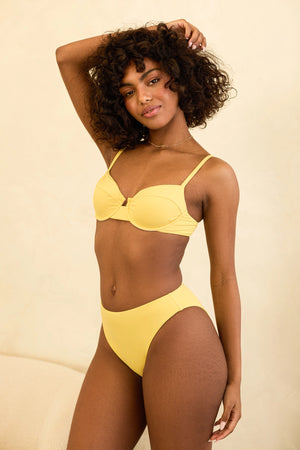 Timani is 5'8.5" wearing S.