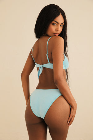 Timani is 5'8.5" wearing S.
