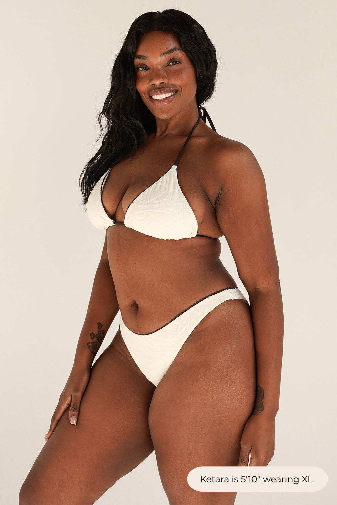 Ketara is 5'10" wearing XL.