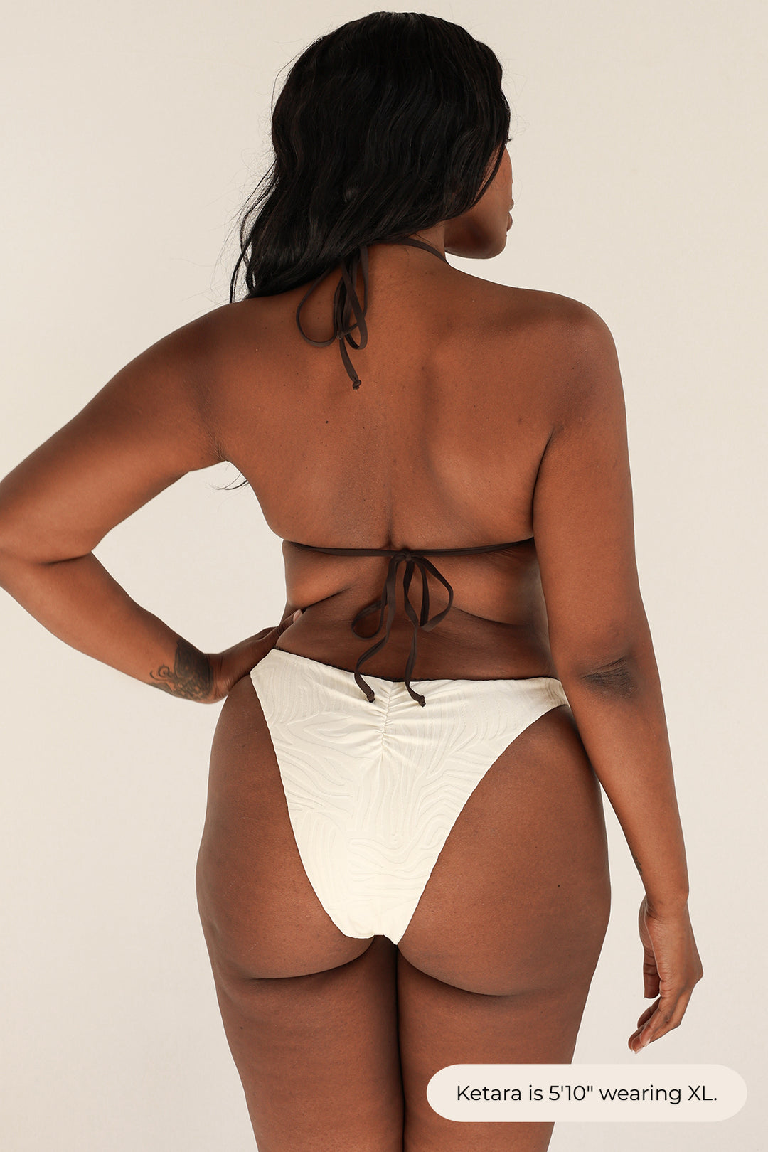 Ketara is 5'10" wearing XL.