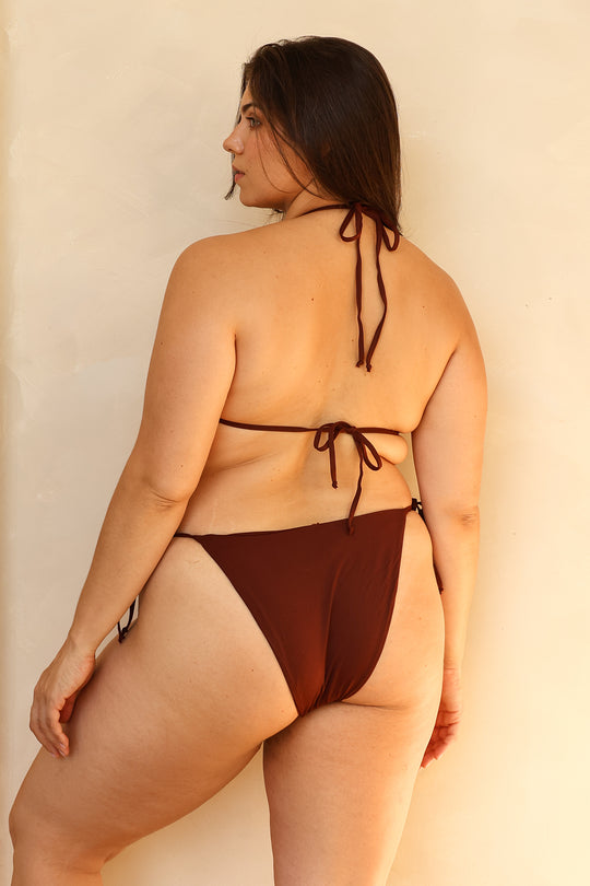 Juliana is 5'10" wearing XL.