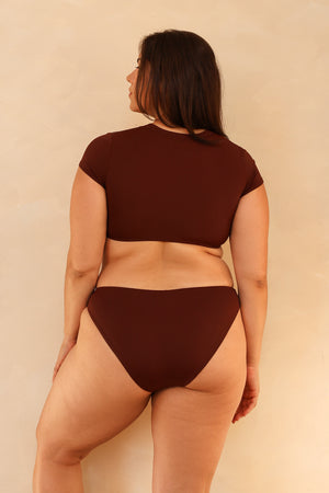 Juliana is 5'10" wearing XL.