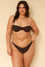 Hannah is 5'10" wearing XL.