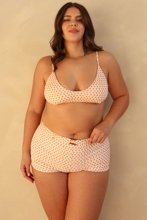 Hannah is 5'10" wearing XL.