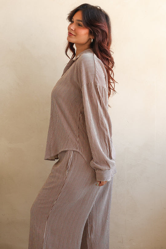 Noey is 5'3" wearing M.