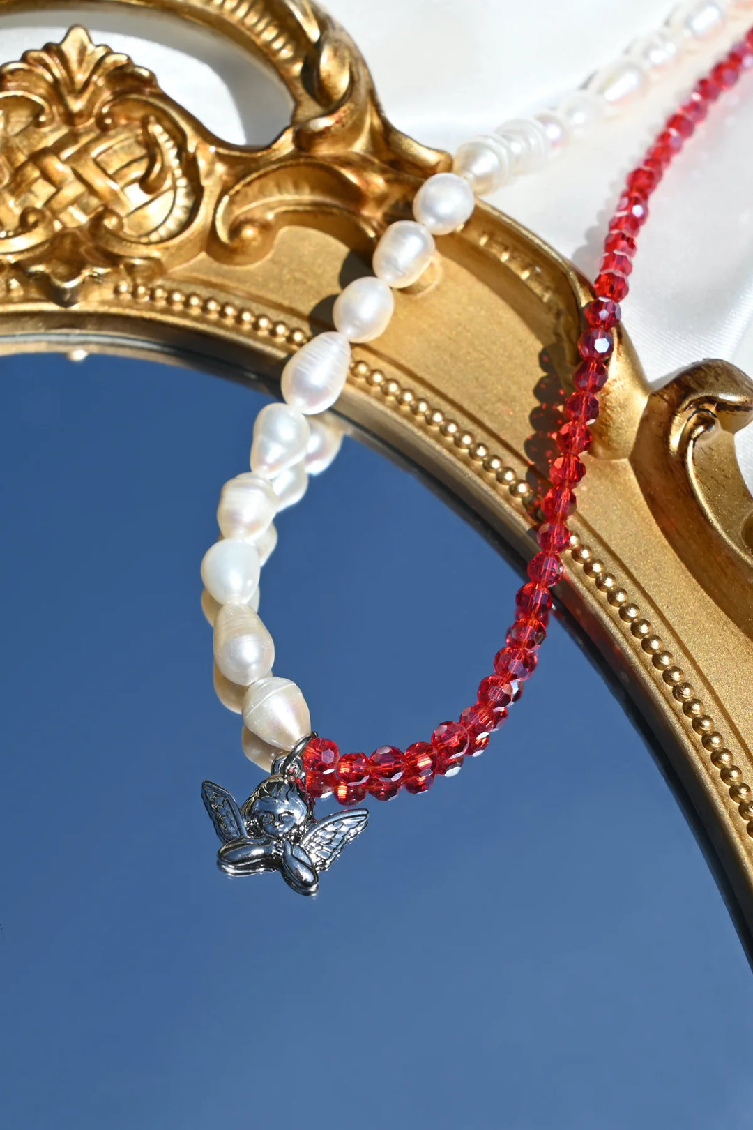 DDBJCN-RED silver cherub necklace red 1 dippin' daisy's