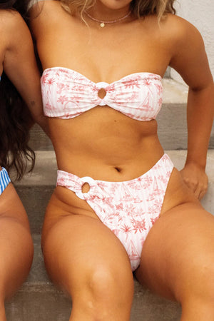 Bre is 5'7" wearing Size M.