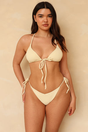 Breanna is 5'9 wearing Size L.