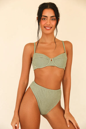 Tara is 5'8.5" wearing XS.