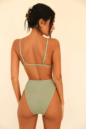 Tara is 5'8.5" wearing XS.