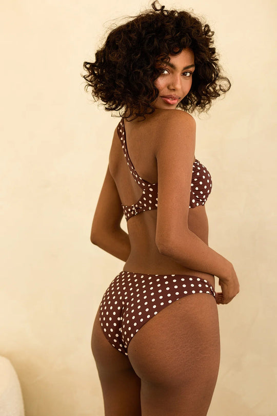 Timani is 5'8.5" wearing S.