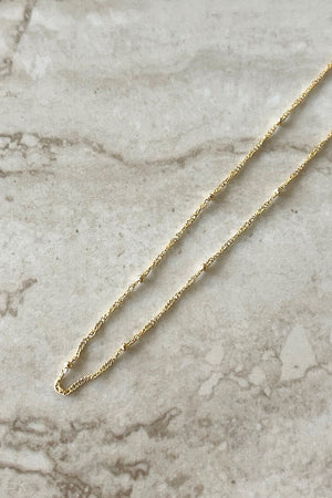 GN7243GD-GLD jingle bell necklace gold 1 dippin' daisy's