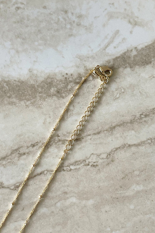 GN7243GD-GLD jingle bell necklace gold 3 dippin' daisy's