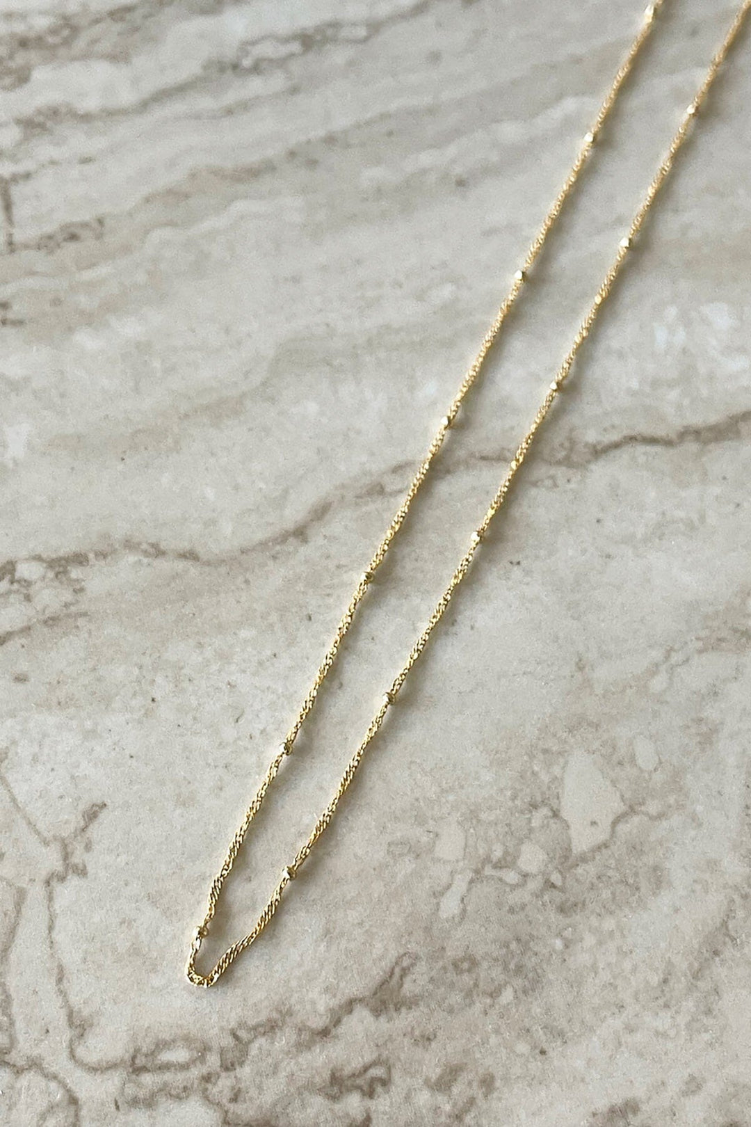 GN7243GD-GLD jingle bell necklace gold 6 dippin' daisy's